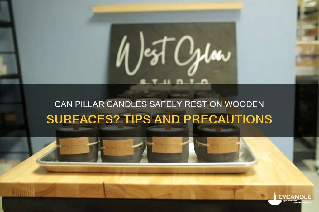 can a pillar candle be placed on wood