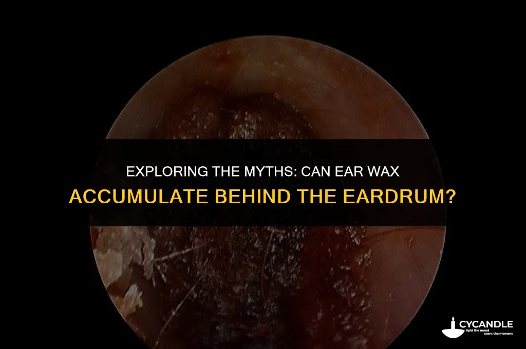 can ear wax build up behind the eardrum