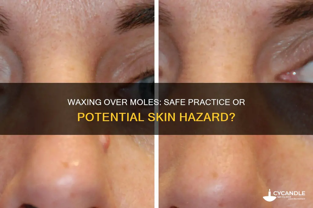 can i put a wax strip over a mole