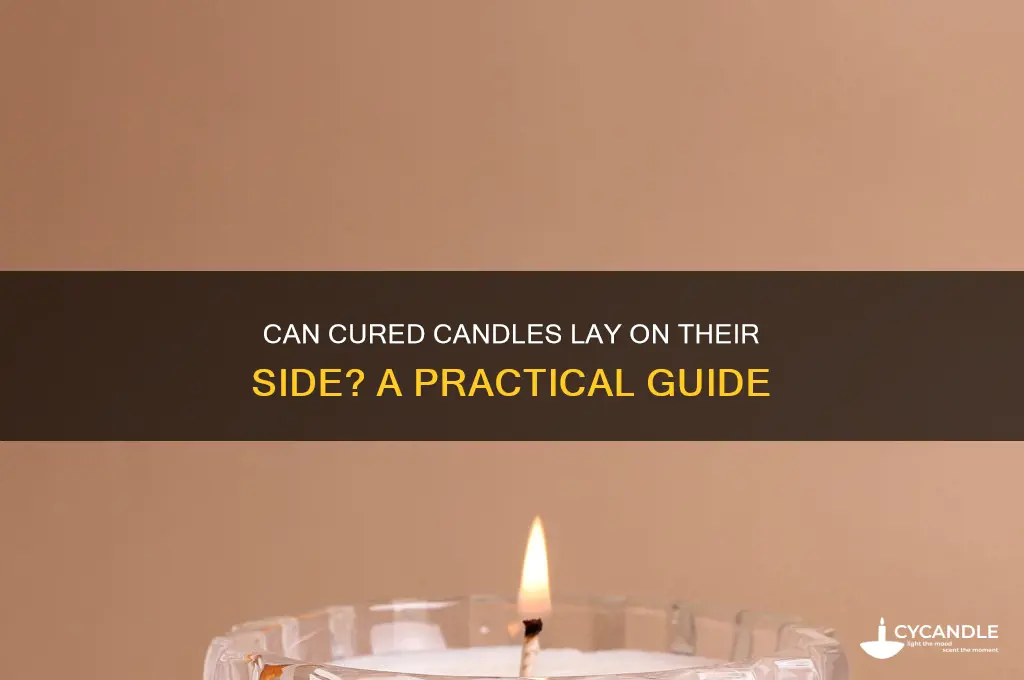 can lay a candle on its side once cured