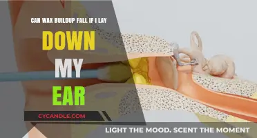 Can Ear Wax Buildup Fall Out When Lying Down?