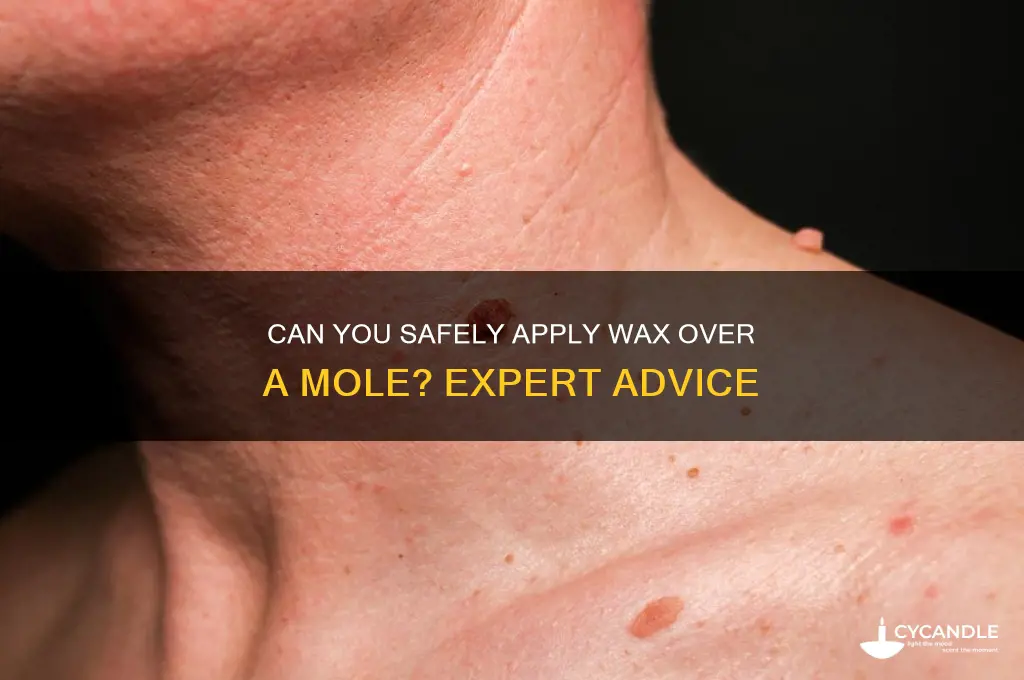 can wax over a mole