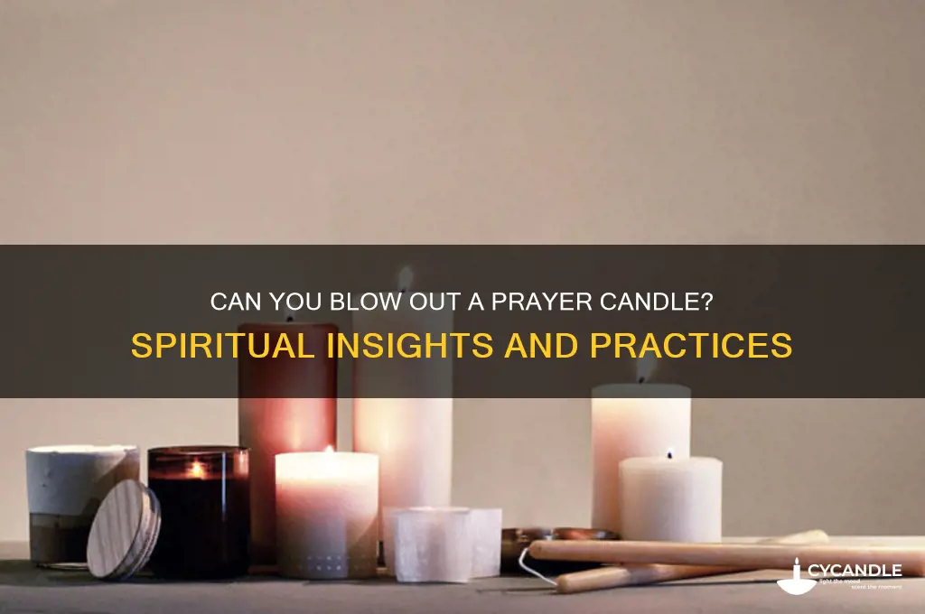 can you blow out a prayer candle