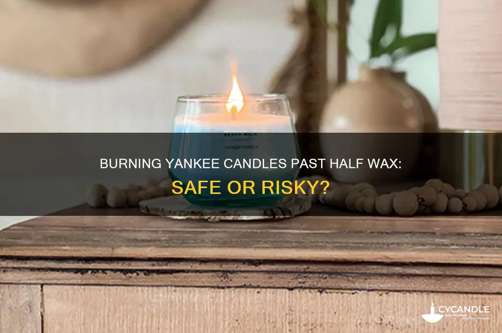 can you burn a yankee candle past half wax