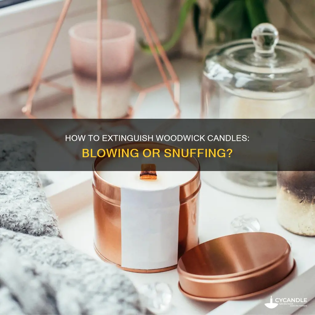 do you blow out a woodwick candle