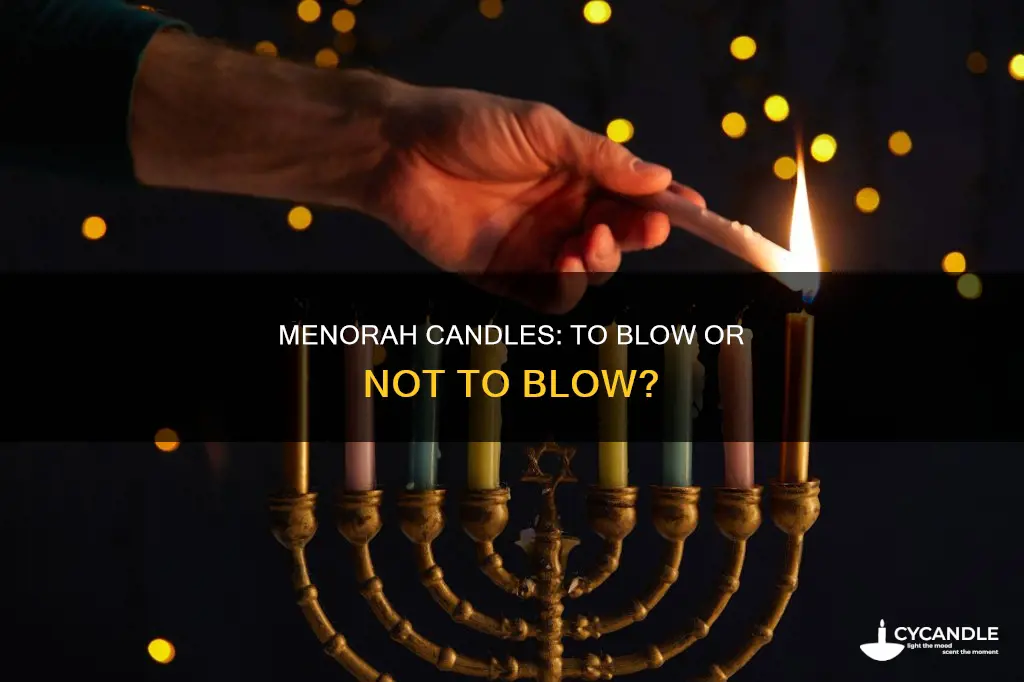 do you blow out menorah candles