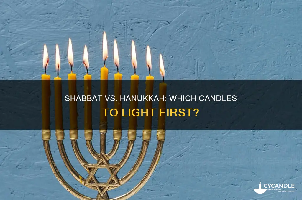 do you light shabbat candles or hanukkah candles first