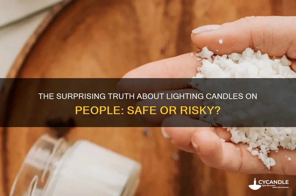 does lighting candles on people