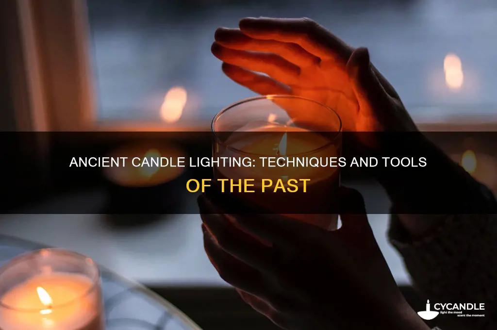 how did ancient people light candles