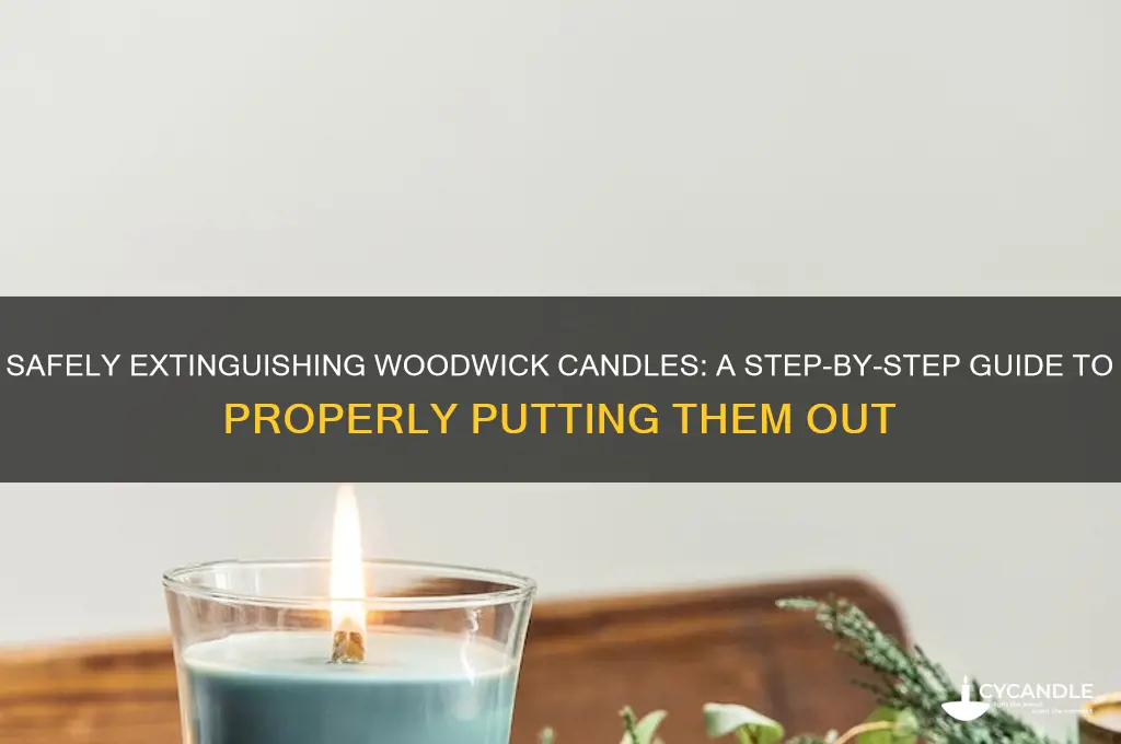 how do you put out a woodwick candle