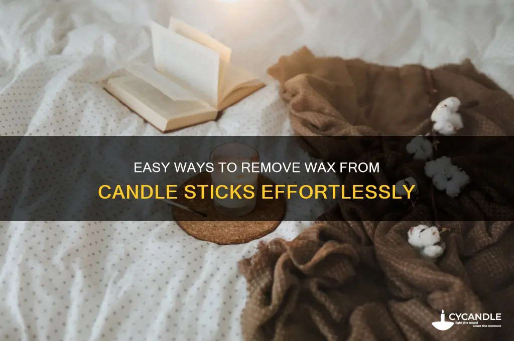 how to get wax off candle sticks