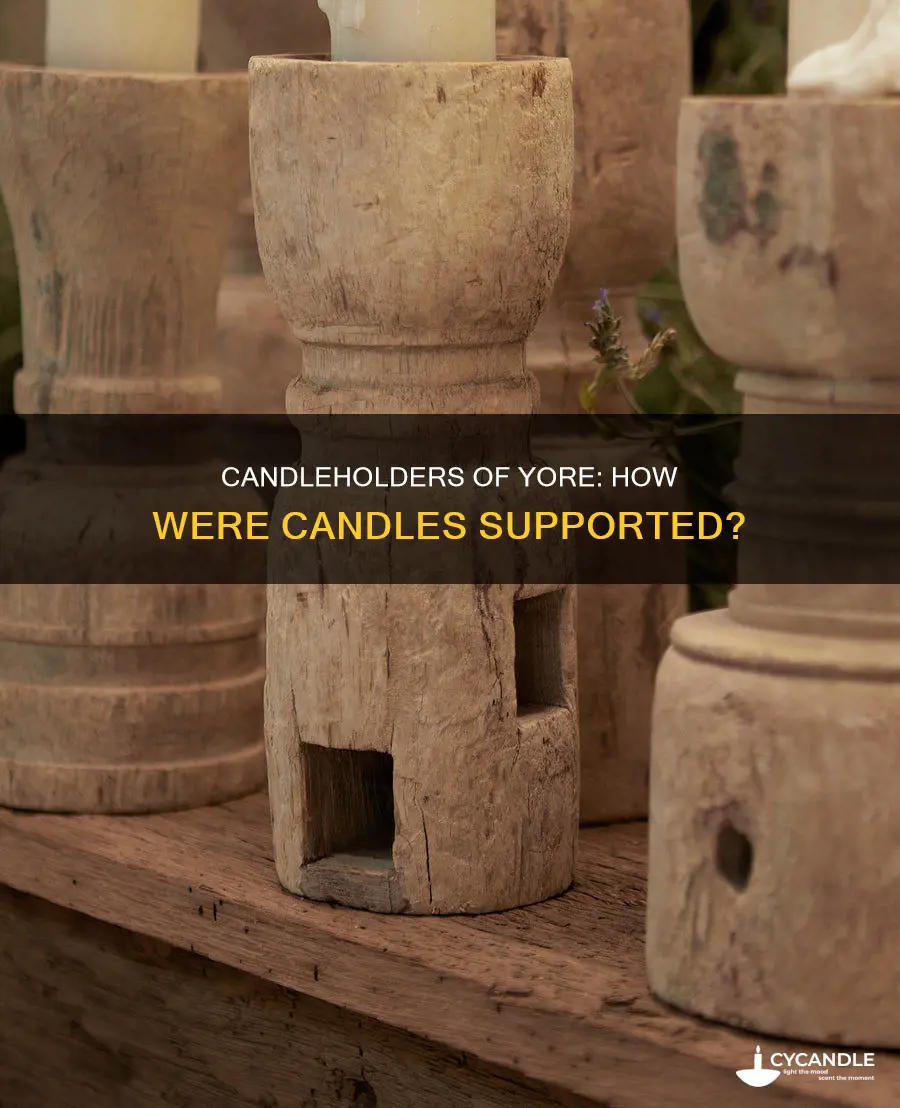how were candles held in the olden times
