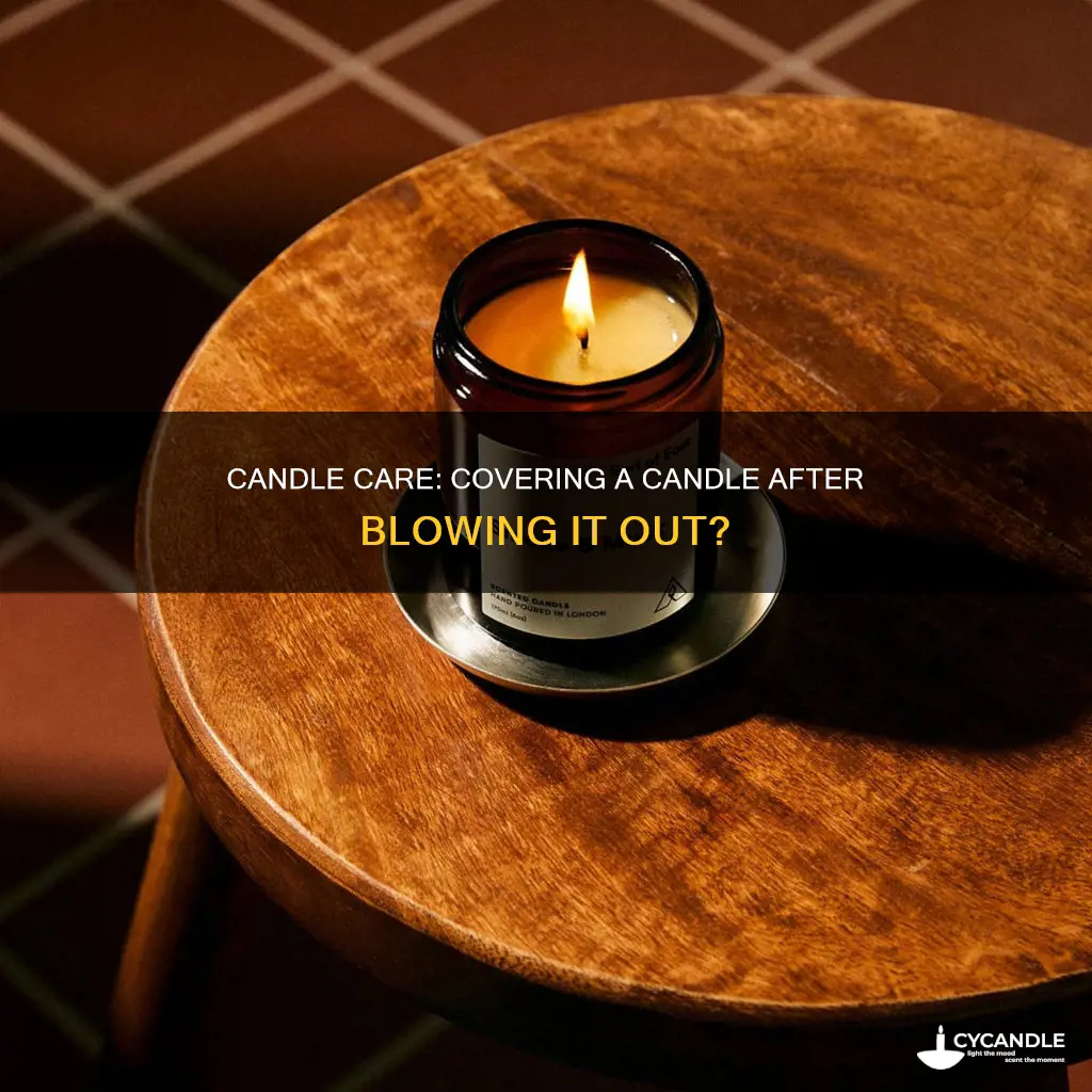is covering a candle after blowing it out