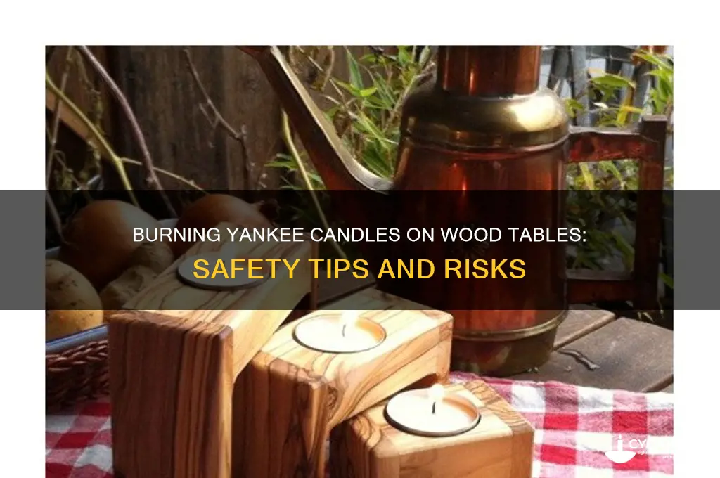 is it safe to burn yankee candle on wood table