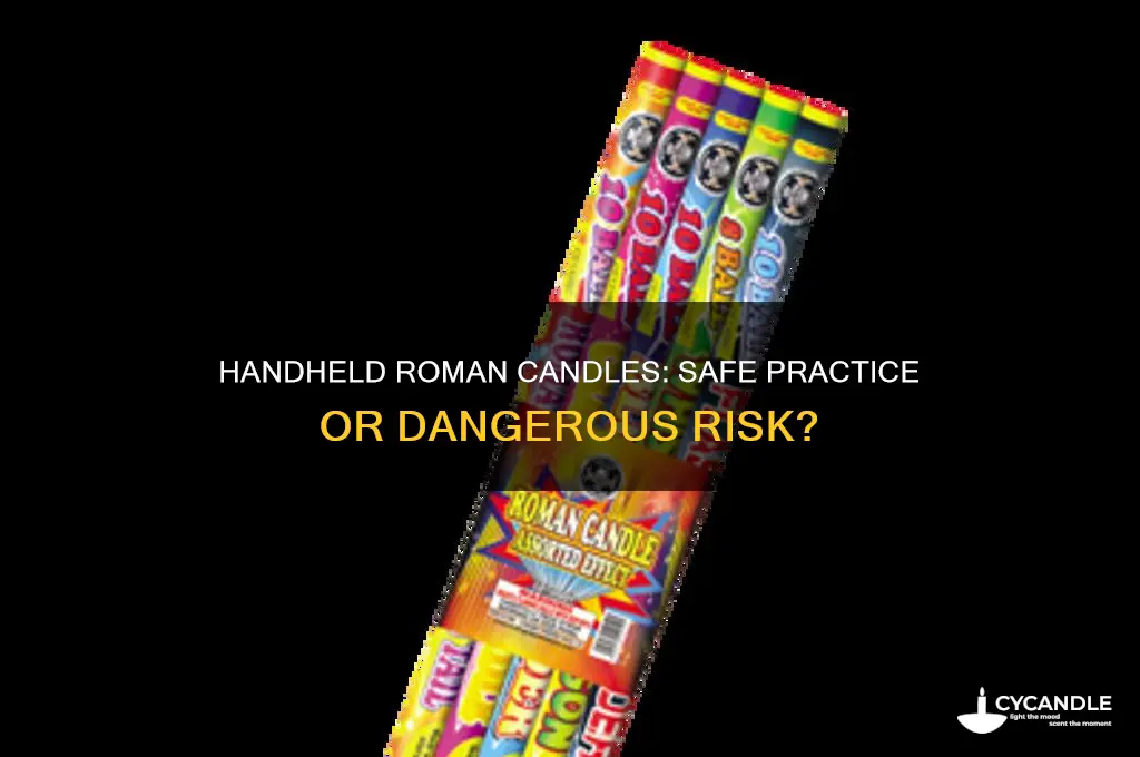 is it safe to hold roman candles in your hand