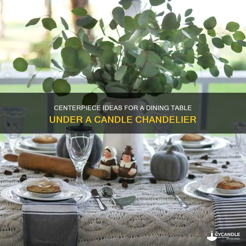 what centerpiece for the dining table under a candle chanalier