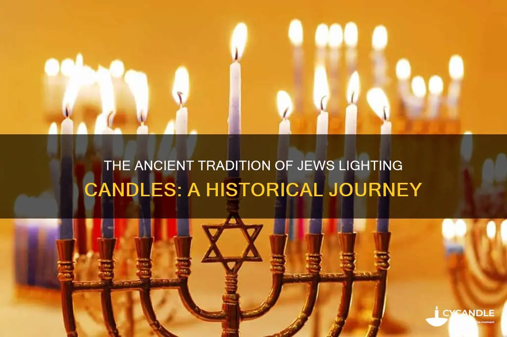 what is the hisory of jews lighting candles