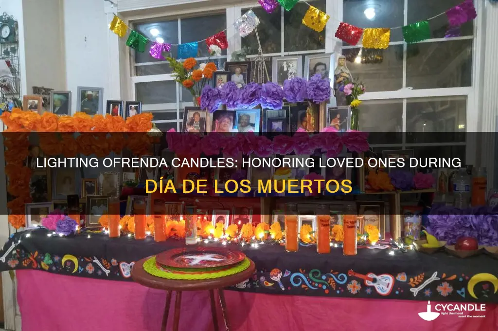 when do you light the candles on the ofrenda