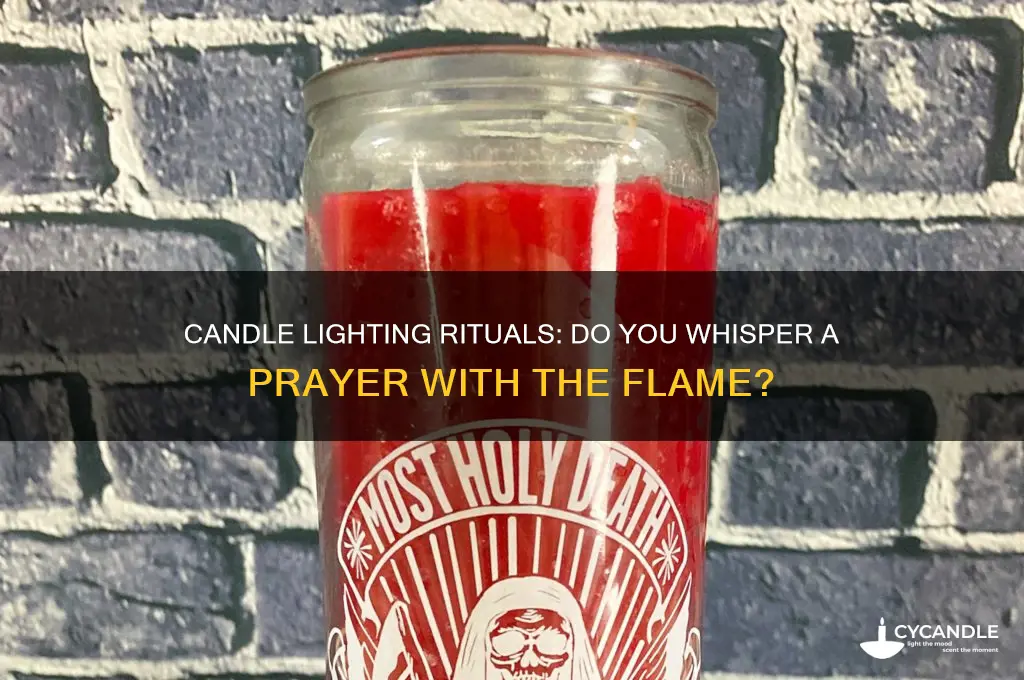 when lighting a candle do you ssay a pray