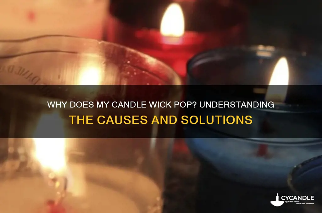 why does my candle wick pop when i light it