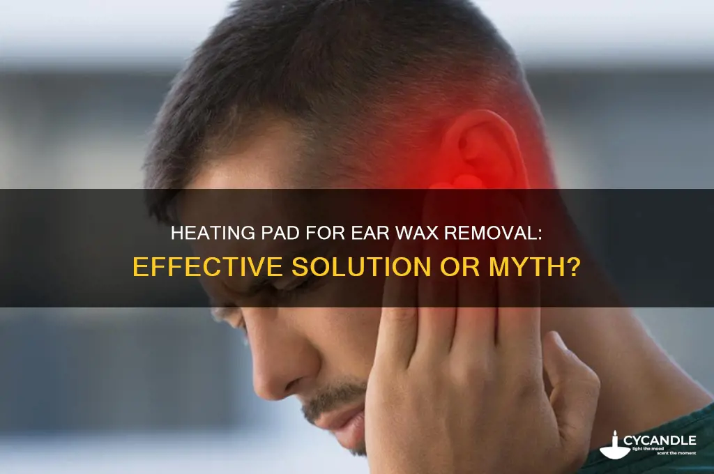 will a heating pad help remove ear wax